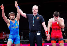 Four medals of Greco-Roman wrestlers