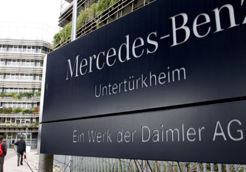 Mercedes-Benz profits almost halved