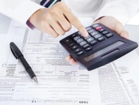 1560_03_depositphotos_39999535-stock-photo-counting-business-taxes
