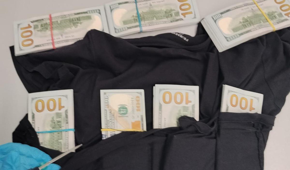 At the airport, a passenger was found to have $60,000 in hidden pockets